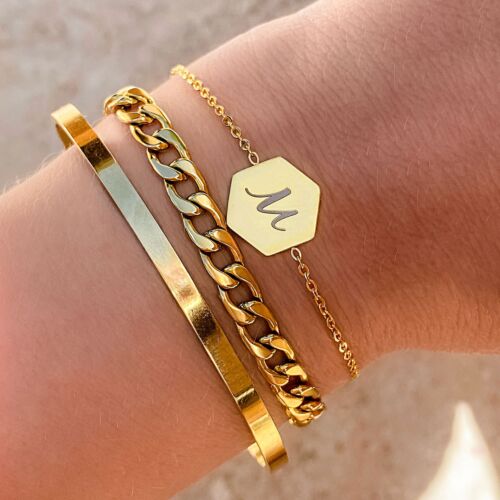 Mooie gouden armparty voor een complete look