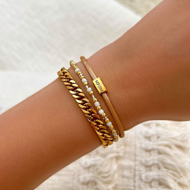 Gouden armparty met wit