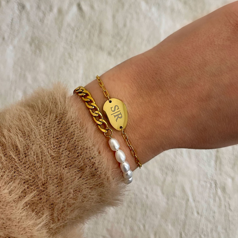 Pols met goud kleurige armcandy