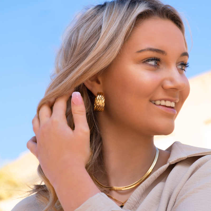 Platte snake ketting goudkleurig