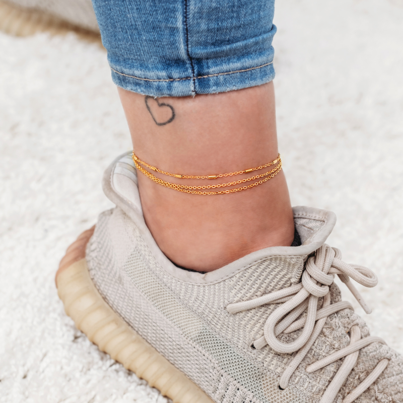Gouden enkelbandjes met schakels