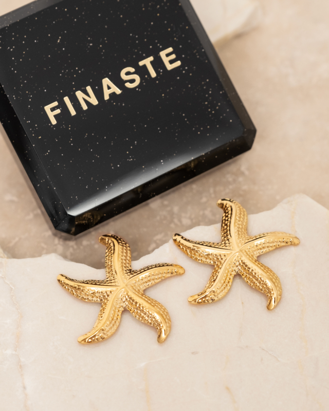 Gouden oorbellen met zeester