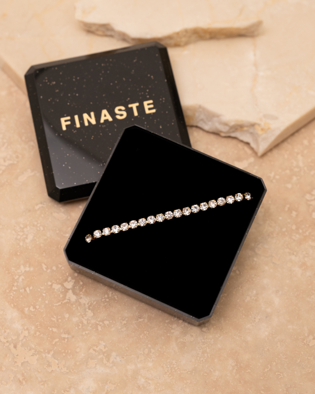 Gouden tennis ketting in sieradendoosje