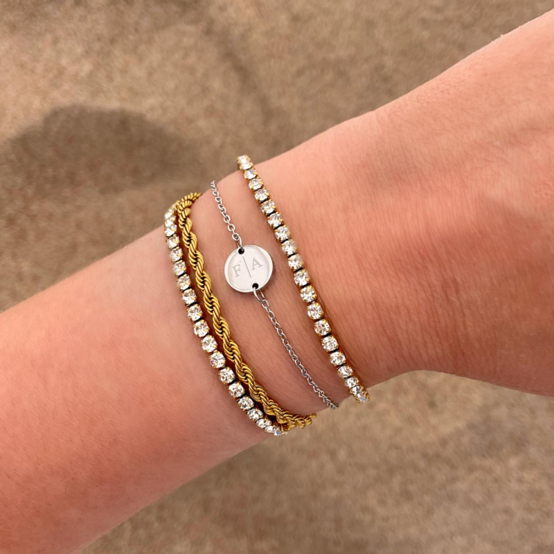 gouden en zilveren armbanden mix