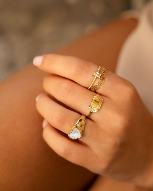 Gouden ringen mix om hand model