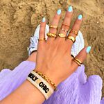 gouden ringen mix om hand
