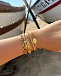 Gouden armbanden met bedels