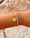 Mix van gouden armbanden