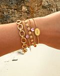 Gouden armparty met roze details
