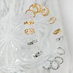 Mix van zilveren en gouden ear cuffs 