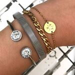 Armparty met armbandjes in het goud en zilver