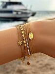 Gouden armbanden daisy
