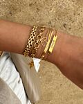 Gouden armparty op het strand