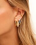 Gouden oorbellen mix bij model