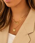 Gouden necklaceparty met initials en hartje