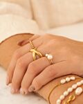Gouden ringparty met parels
