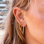 Gouden earparty met diamantjes