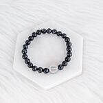 Heren armband op marmer plaatje