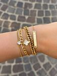 Mix van gouden armbanden