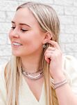 Trendy mix van kettingen voor een complete look