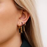 Goudkleurige oorbellen met zwarte details 