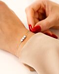 Love armband om pols