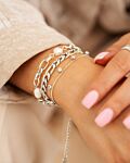 Zilveren armparty met parels