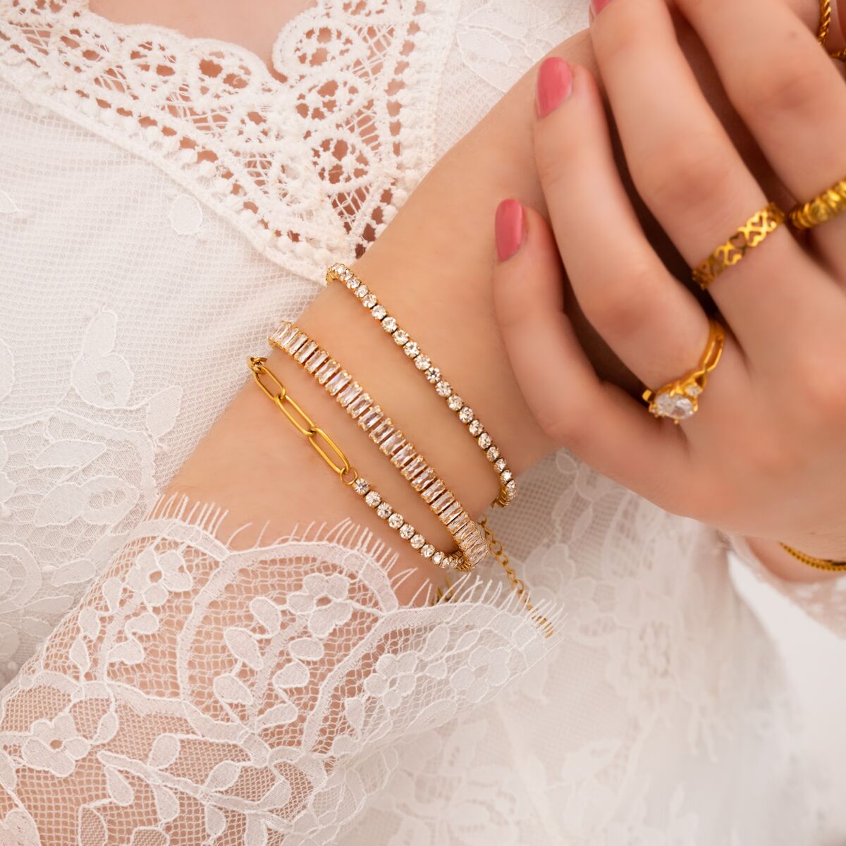 Mix van gouden armbanden