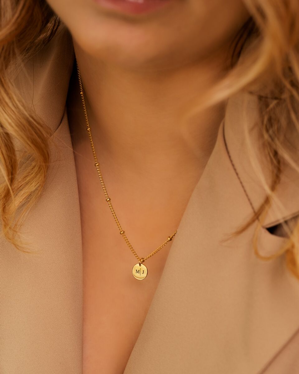 Gouden ketting met graveerbaar muntje