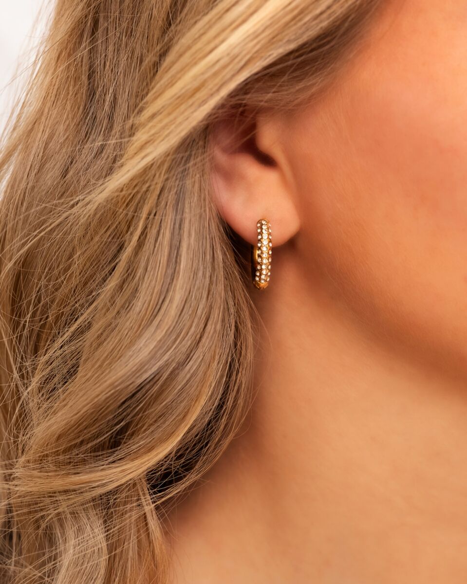 Gouden oorbellen met shiny steentjes