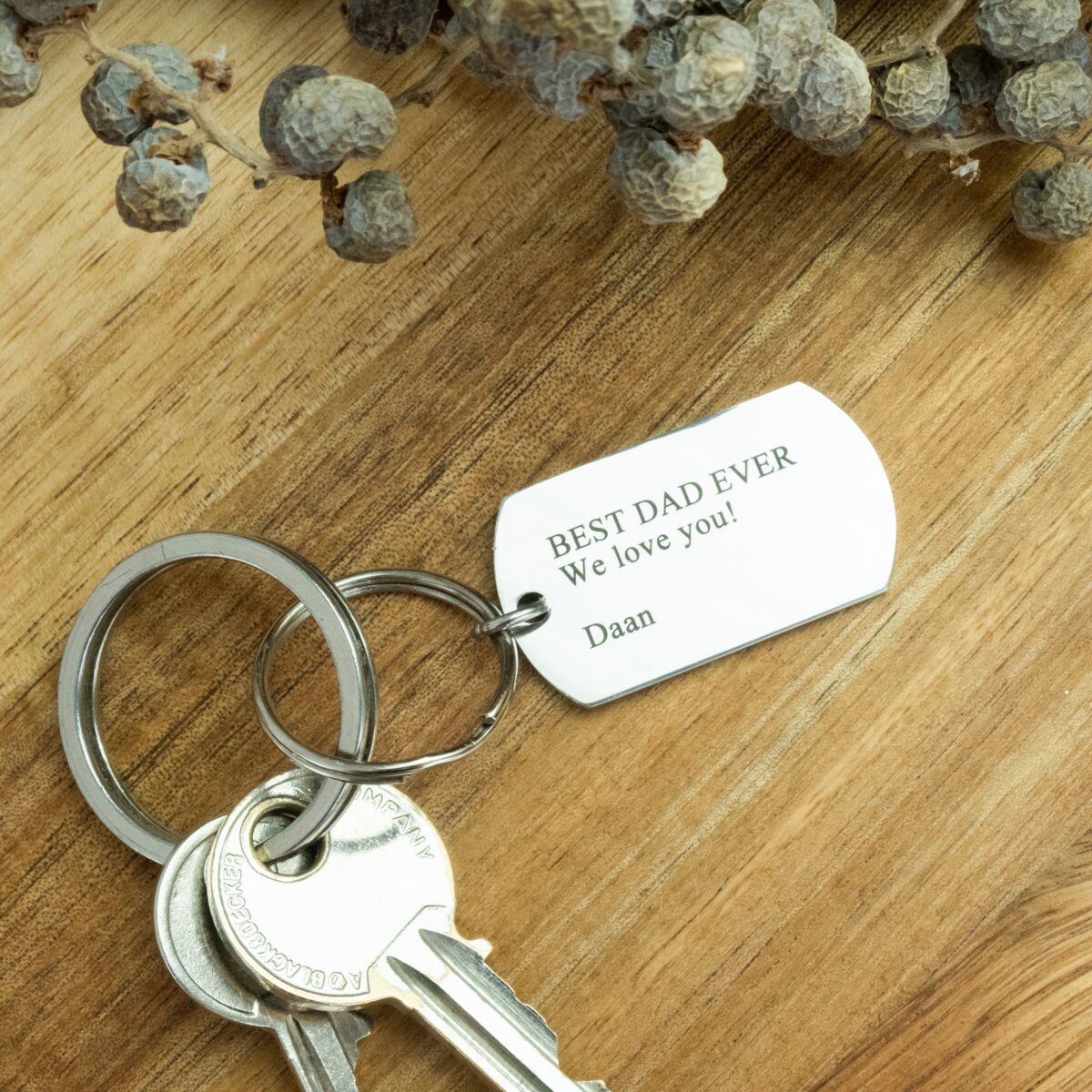 Zilveren sleutelhanger met tekst