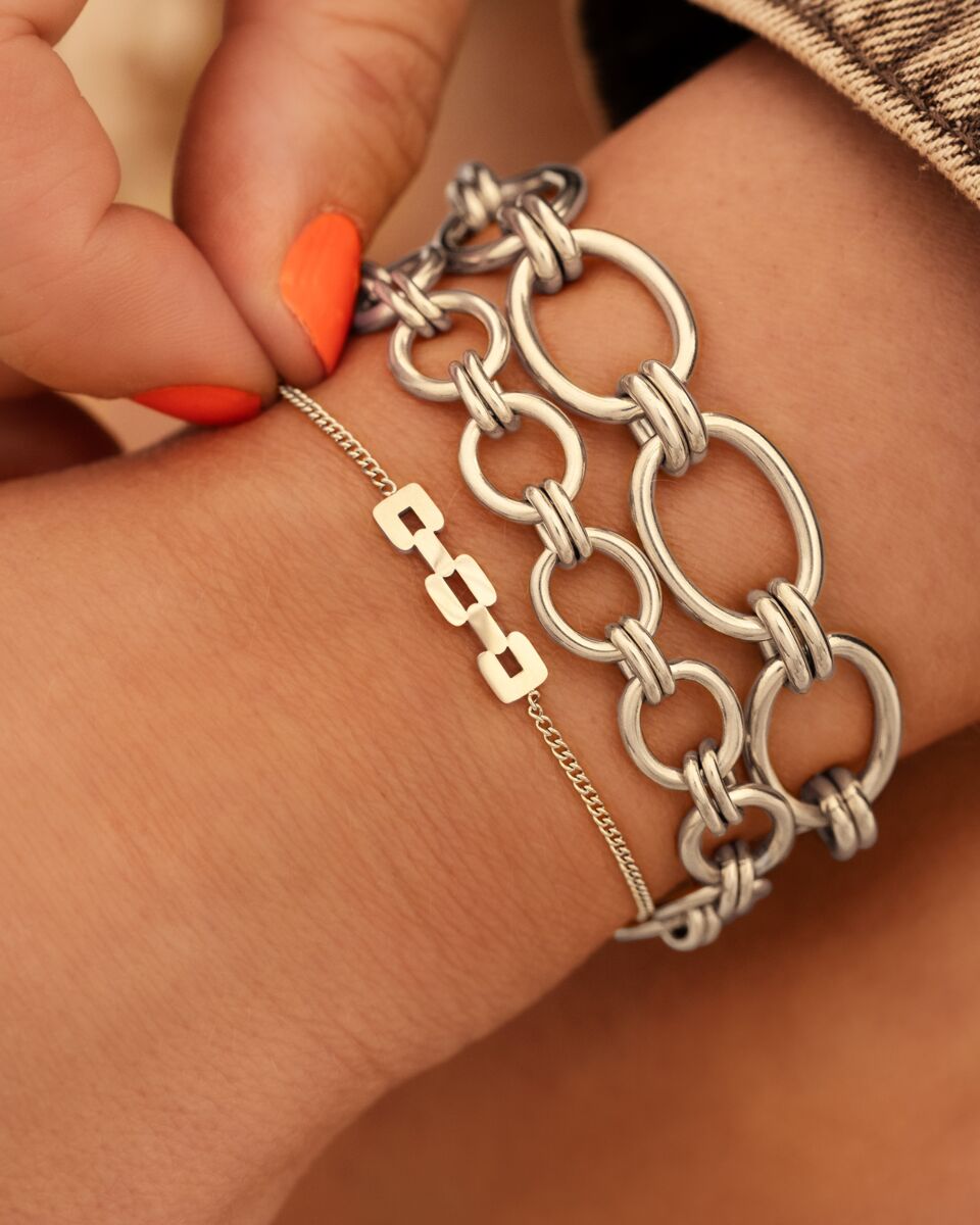 Zilveren armparty met chains
