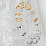 Zilveren en gouden ear cuffs