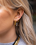 gouden earparty met zwart detail