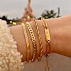 Gouden armbanden combinatie met gravering