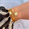 Armparty met schakelarmband gemixed in de kleur goud