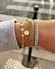 Platte armband mesh goud kleurig