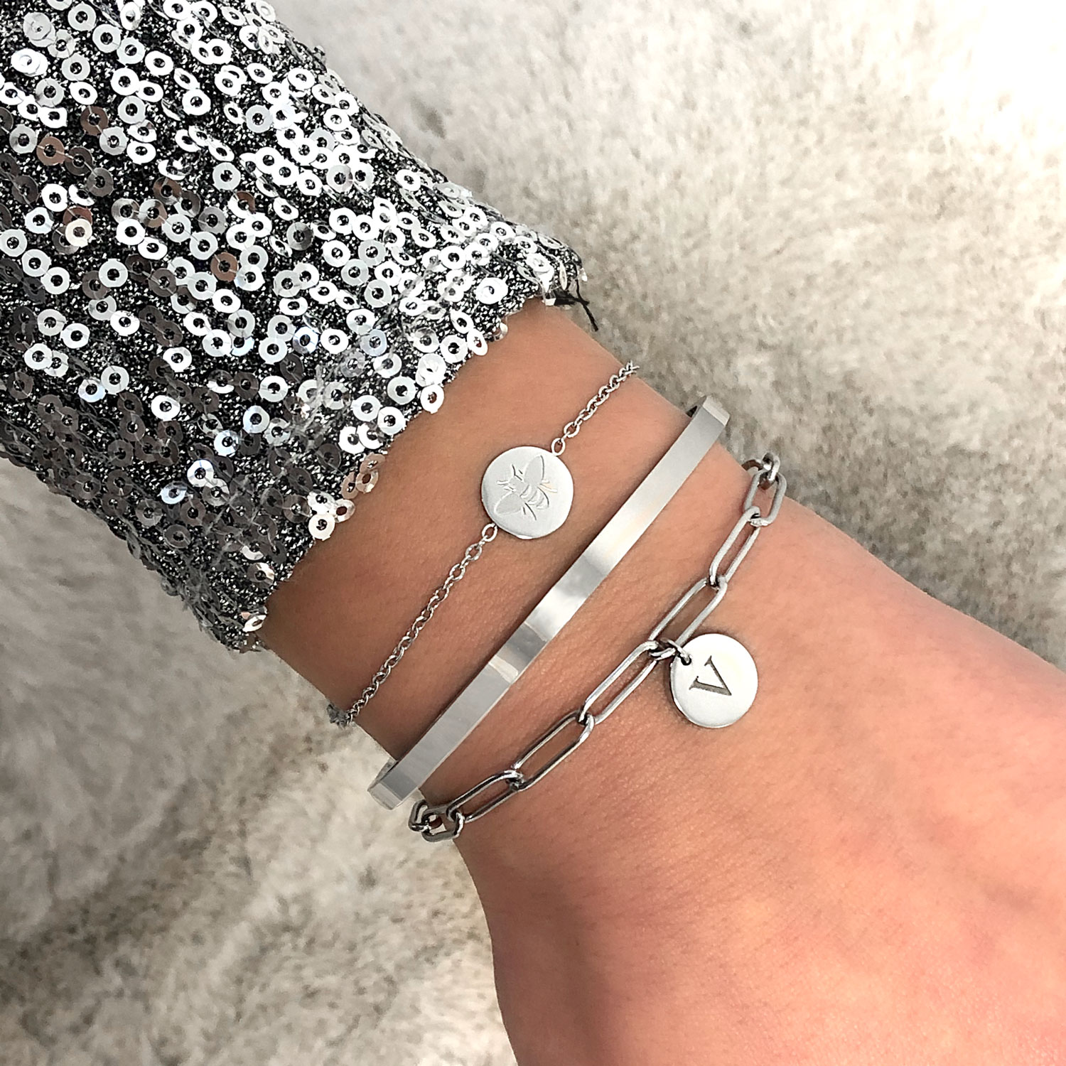 armparty met zilveren bijen armbandje bar armband en schakelarmband